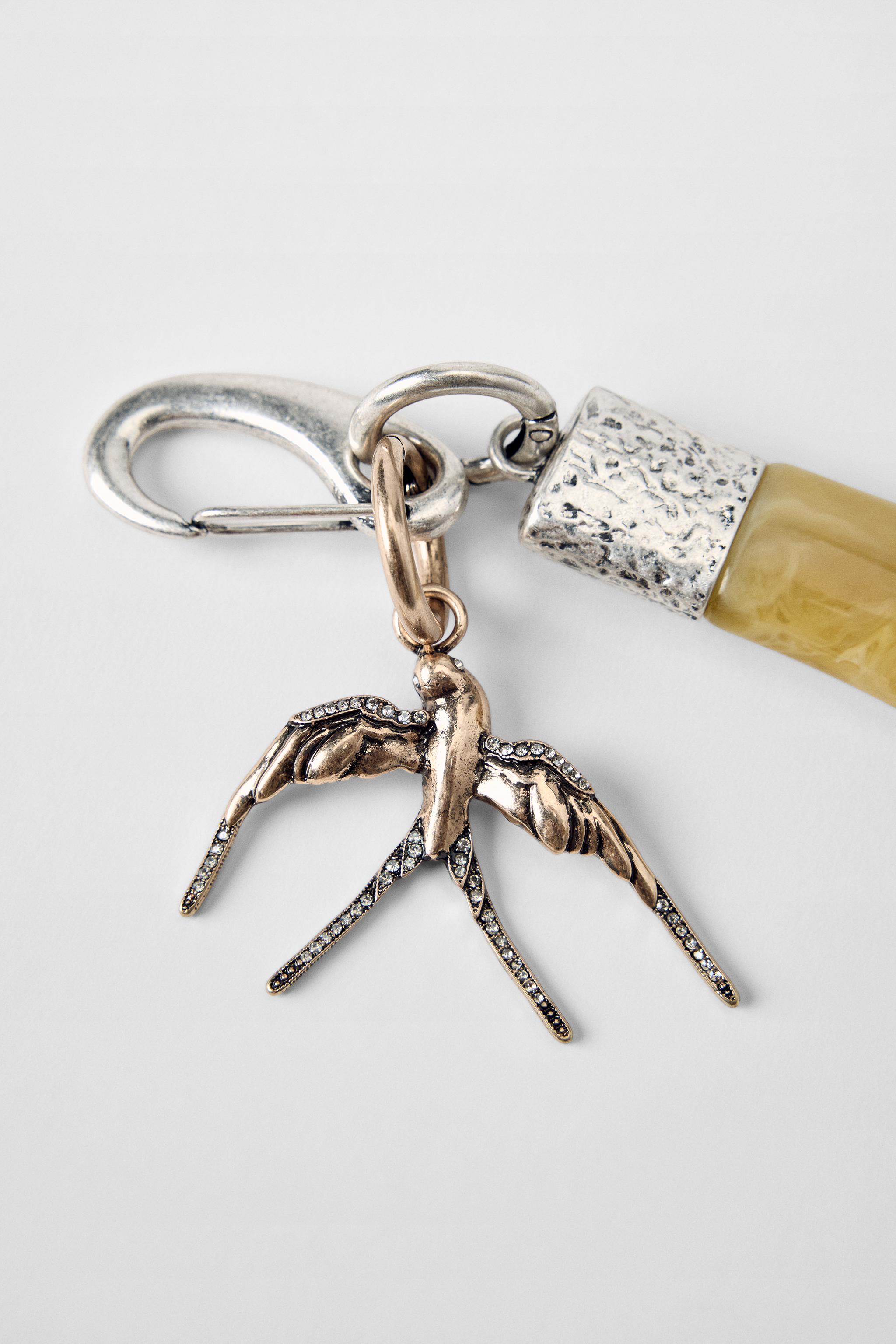 PORTE-CLÉS EN MATIÈRES VARIÉES CHARMS CORNE KATE MOSS X ZARA